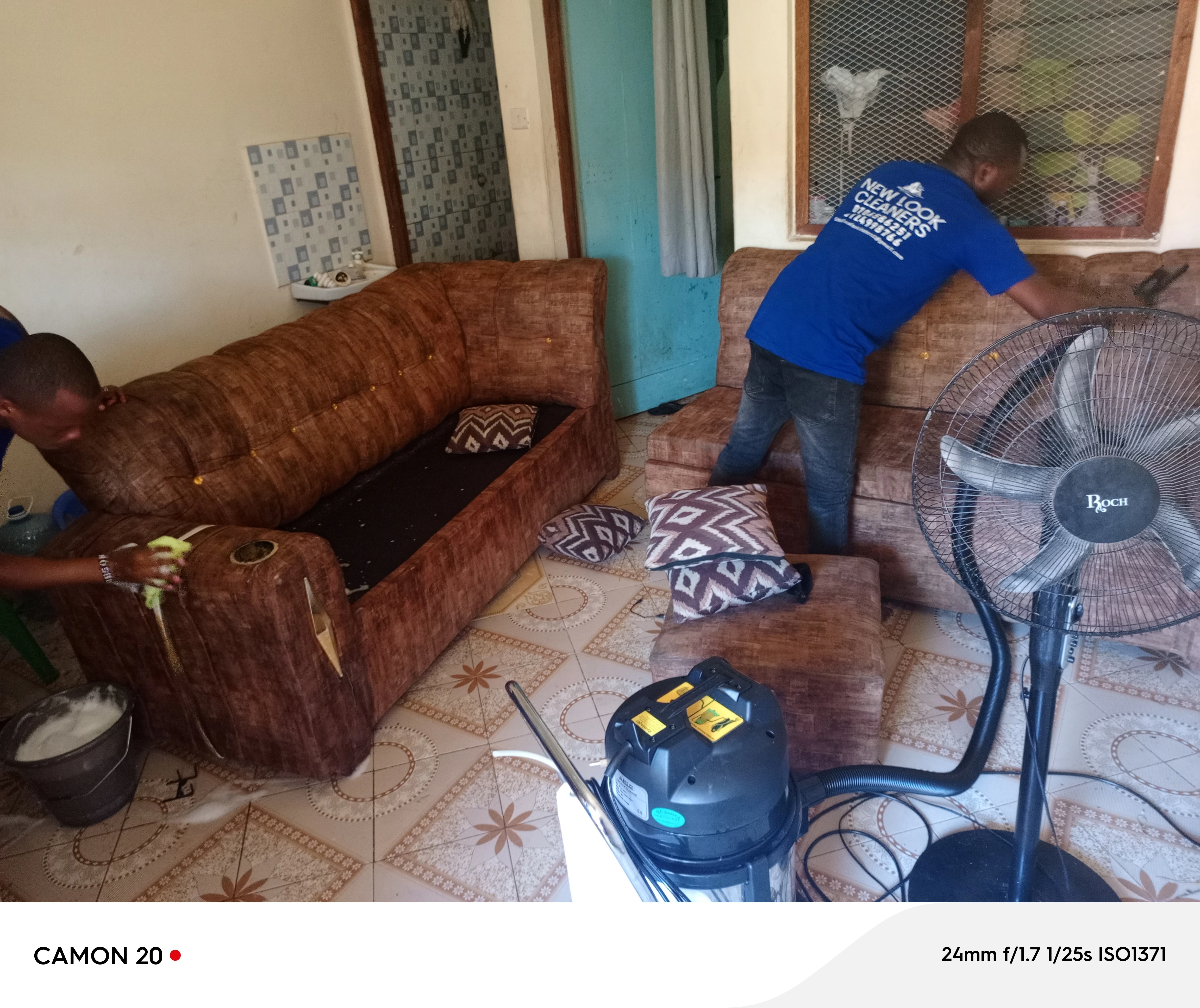 Brown sofa cleaning in progress